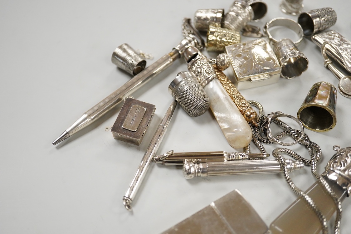 A Victorian silver vinaigrette, Edward Smith, Birmingham, 1848, 27mm, a collection of thimbles including some silver and sundry other items including pencils, child's rattle, button hooks, silver pocket watch, silver Ala